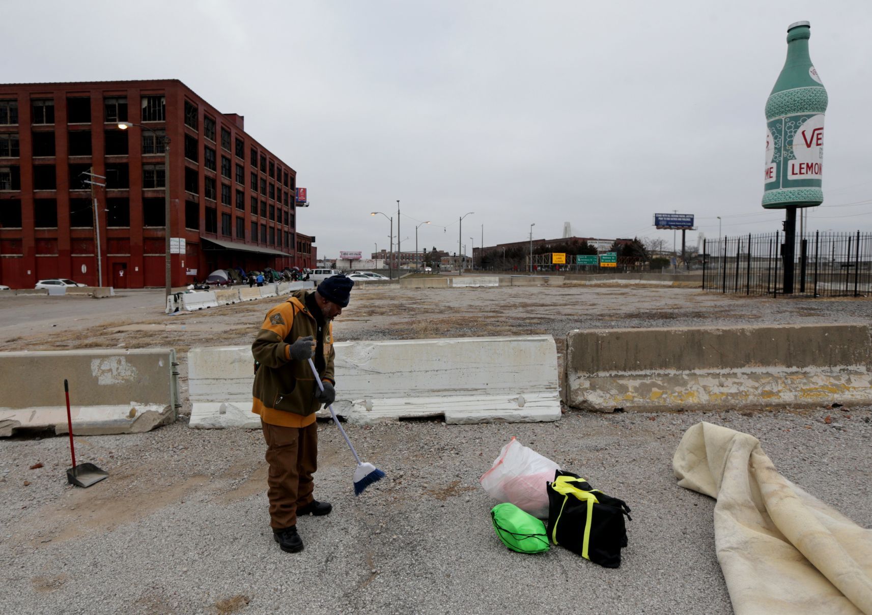 Tent encampment outside vacant McGuire Moving & Storage building